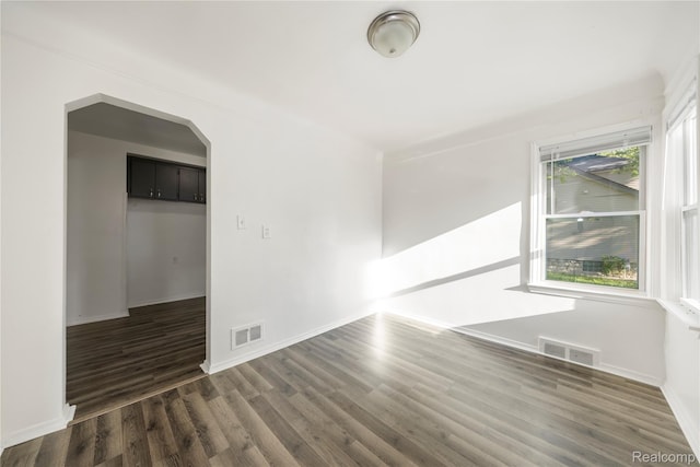 20258 Caldwell St, Detroit, MI 48234 - empty room featuring wood finished floors and arched walkways