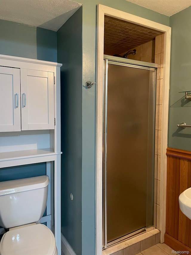 21150 E Chigwidden St, Northville, MI 48167 - full bath featuring a stall shower, tile patterned floors, and a textured ceiling