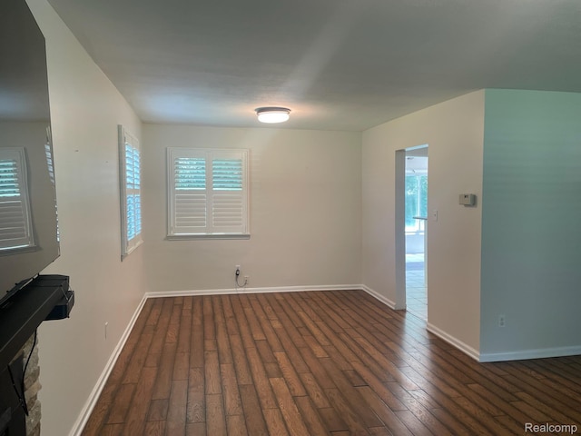 21150 E Chigwidden St, Northville, MI 48167 - unfurnished room featuring dark wood-type flooring and baseboards