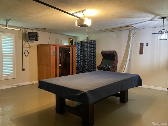 21150 E Chigwidden St, Northville, MI 48167 - game room featuring concrete flooring, billiards, and a heating unit