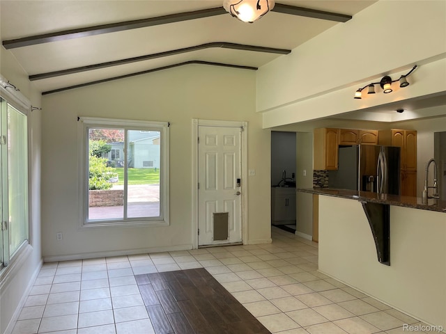 21150 E Chigwidden St, Northville, MI 48167 - foyer featuring light tile patterned floors and baseboards