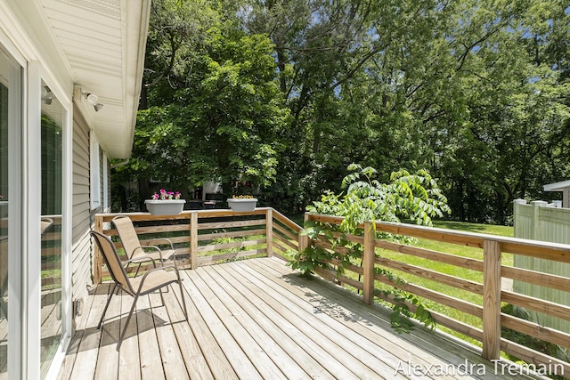 1602 4th St NW, Grand Rapids, MI 49504 - wooden deck with view of scattered trees
