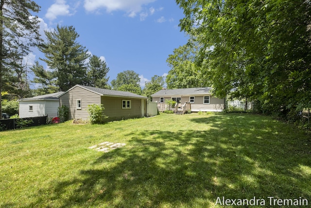 1602 4th St NW, Grand Rapids, MI 49504 - view of yard featuring a deck