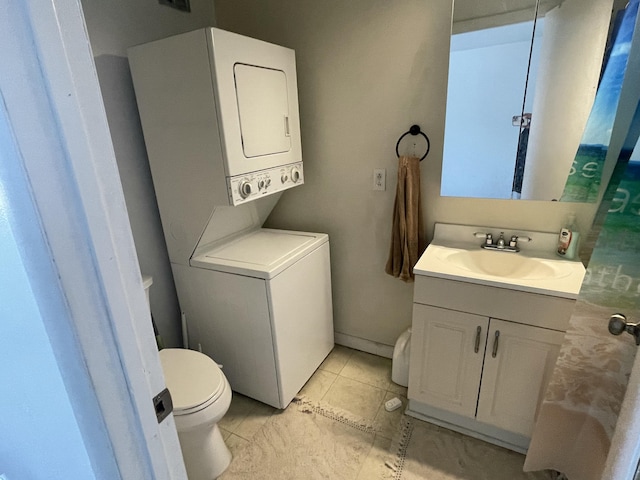 31831 Grand River Ave Unit 96, Farmington, MI 48336 - bathroom with estacked washer and dryer and vanity