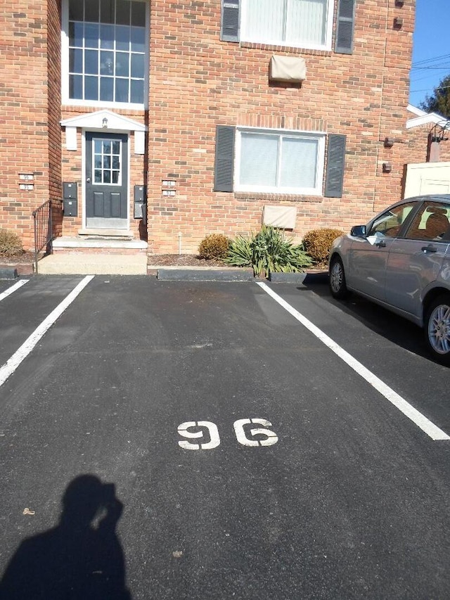 31831 Grand River Ave Unit 96, Farmington, MI 48336 - view of uncovered parking lot