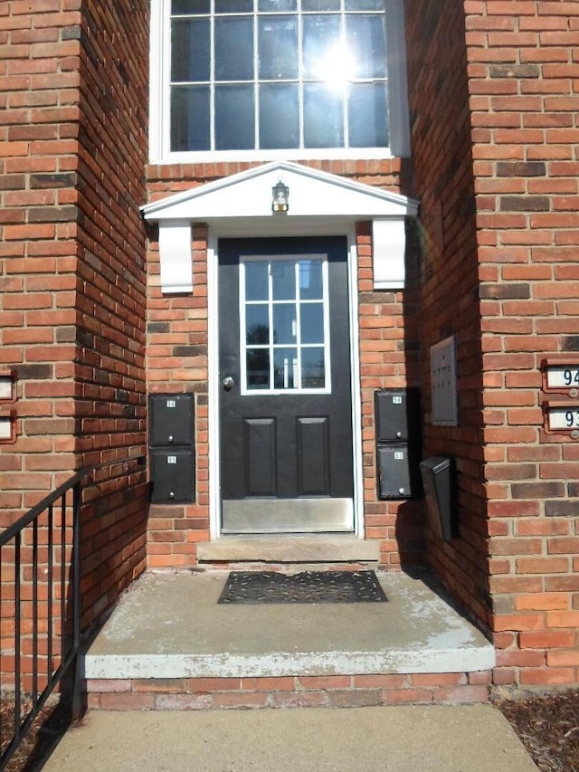 31831 Grand River Ave Unit 96, Farmington, MI 48336 - entrance to property with brick siding