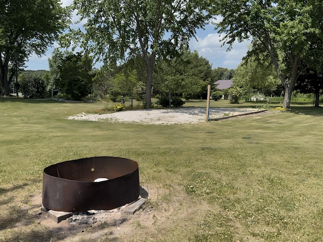 801 S 1st St, Buckley, MI 49620 - view of grassy yard with view of wooded area
