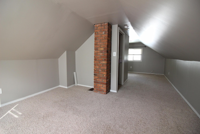24352 Powers Ave, Dearborn Heights, MI 48125 - additional living space with carpet floors and vaulted ceiling