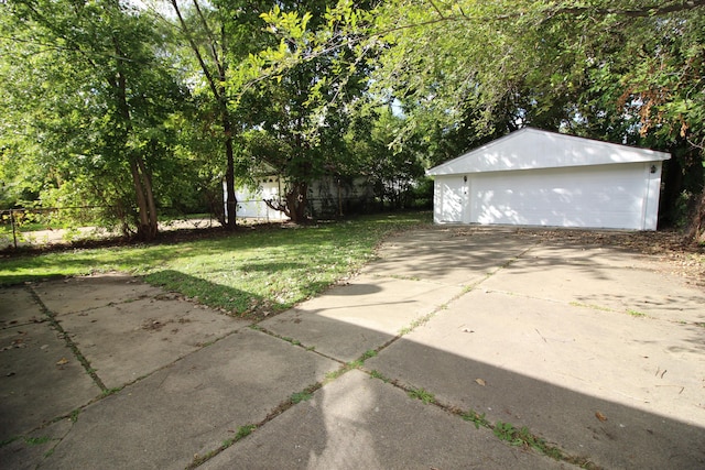 24352 Powers Ave, Dearborn Heights, MI 48125 - view of yard with a garage and an outdoor structure