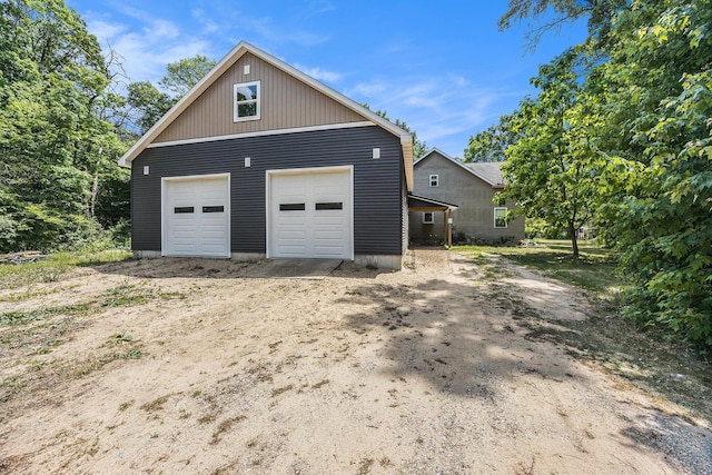 21008 Tamarack Rd, Howard City, MI 49329 - view of side of property with a detached garage