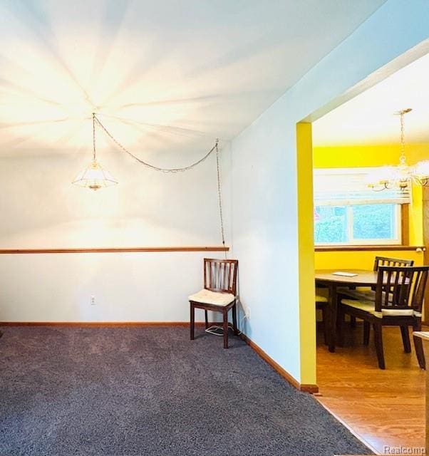 11638 Alois St, Livonia, MI 48150 - empty room with a chandelier and carpet floors