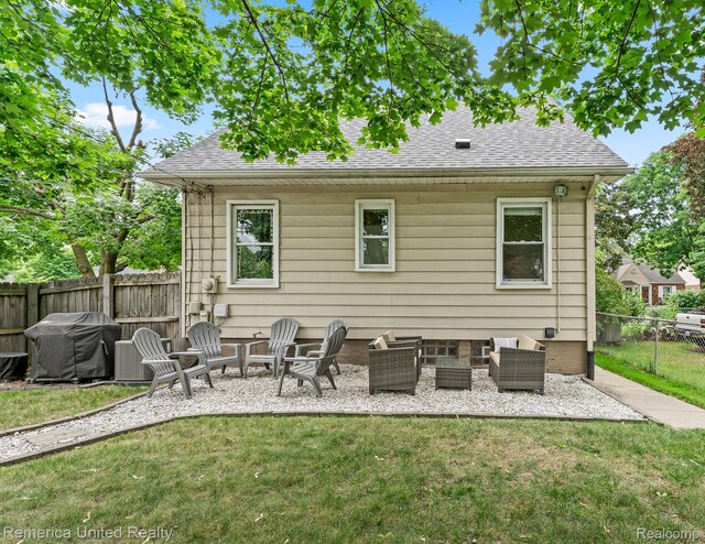 535 S Edison Ave, Royal Oak, MI 48067 - rear view of house with roof with shingles and a patio