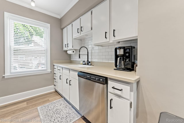 535 S Edison Ave, Royal Oak, MI 48067 - kitchen featuring stainless steel dishwasher, light wood finished floors, crown molding, decorative backsplash, and white cabinets