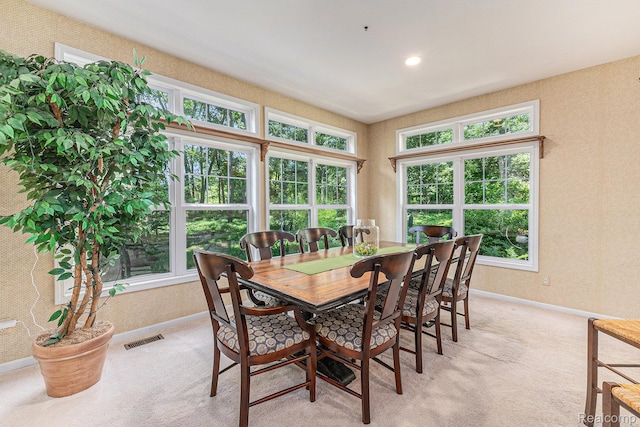 6155 Carey Rd, Commerce Twp, MI 48382 - dining area featuring light carpet, healthy amount of natural light, and wallpapered walls