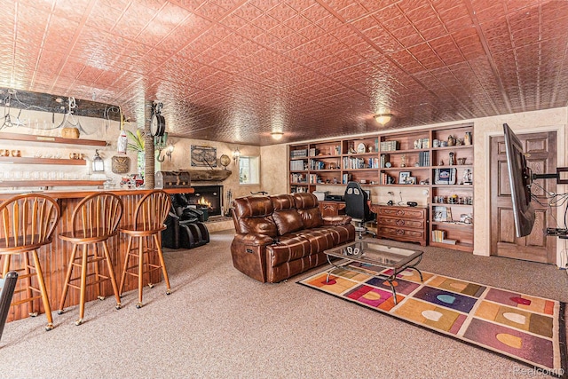 6155 Carey Rd, Commerce Twp, MI 48382 - living room featuring carpet, a lit fireplace, an ornate ceiling, a desk, and a dry bar