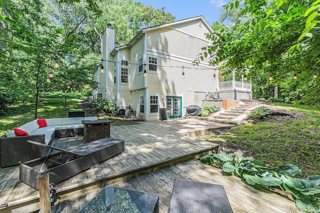 6155 Carey Rd, Commerce Twp, MI 48382 - rear view of property with an outdoor living space, a chimney, and a deck