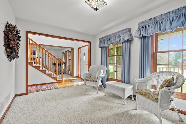 64670 Windrose Way, Lawton, MI 49065 - living area featuring carpet flooring and stairs