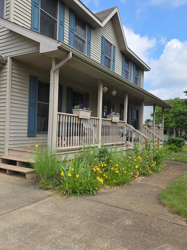 64670 Windrose Way, Lawton, MI 49065 - view of front of home with a porch