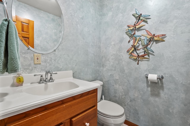 64670 Windrose Way, Lawton, MI 49065 - bathroom with vanity and toilet