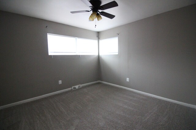 3816 Pokley Ct, Sterling Heights, MI 48310 - carpeted empty room with baseboards and ceiling fan
