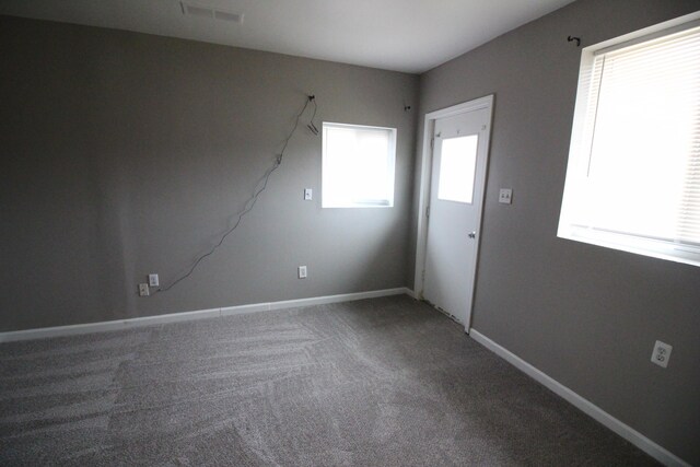 3816 Pokley Ct, Sterling Heights, MI 48310 - carpeted empty room with baseboards