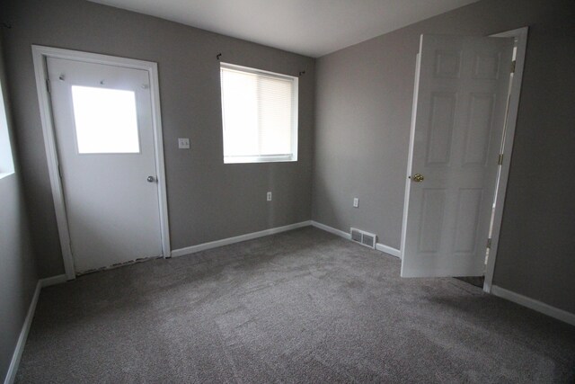 3816 Pokley Ct, Sterling Heights, MI 48310 - spare room featuring carpet floors and baseboards