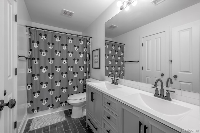 12462 Lillie Rd, Byron, MI 48418 - bathroom featuring double vanity, tile patterned flooring, and shower / tub combo with curtain