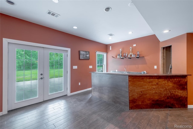 12462 Lillie Rd, Byron, MI 48418 - kitchen with french doors, wood finished floors, and recessed lighting