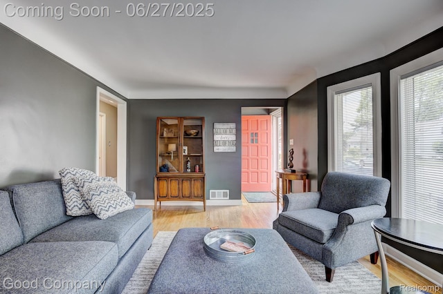 2861 Sunnyknoll Ave, Berkley, MI 48072 - living area with light wood-style floors and baseboards