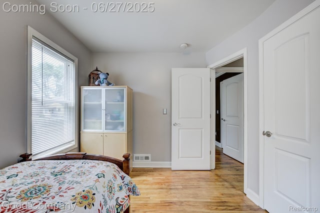 2861 Sunnyknoll Ave, Berkley, MI 48072 - bedroom featuring light wood-style floors and baseboards