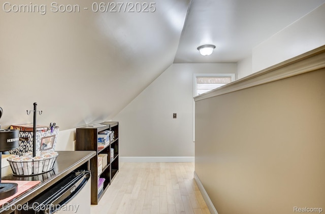 2861 Sunnyknoll Ave, Berkley, MI 48072 - corridor featuring light wood finished floors and lofted ceiling