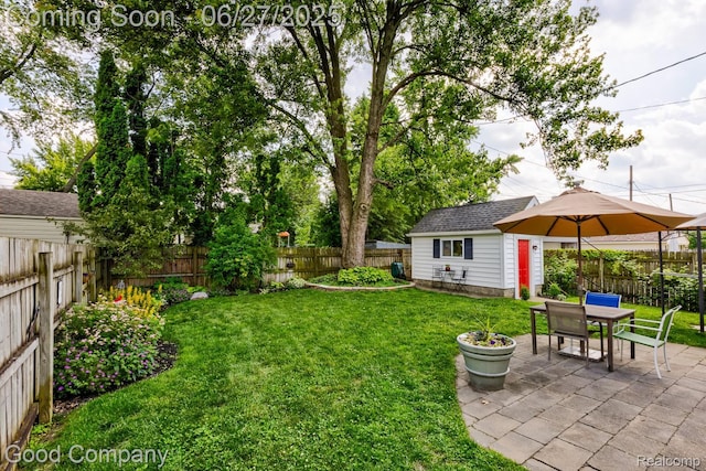 2861 Sunnyknoll Ave, Berkley, MI 48072 - fenced backyard featuring a patio area and an outdoor structure