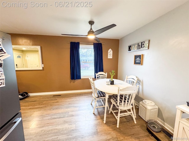474 Argyle Cres, Milan, MI 48160 - dining room featuring light wood-style floors and a ceiling fan