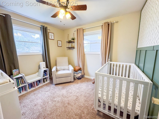 474 Argyle Cres, Milan, MI 48160 - bedroom featuring multiple windows, a nursery area, carpet floors, and ceiling fan