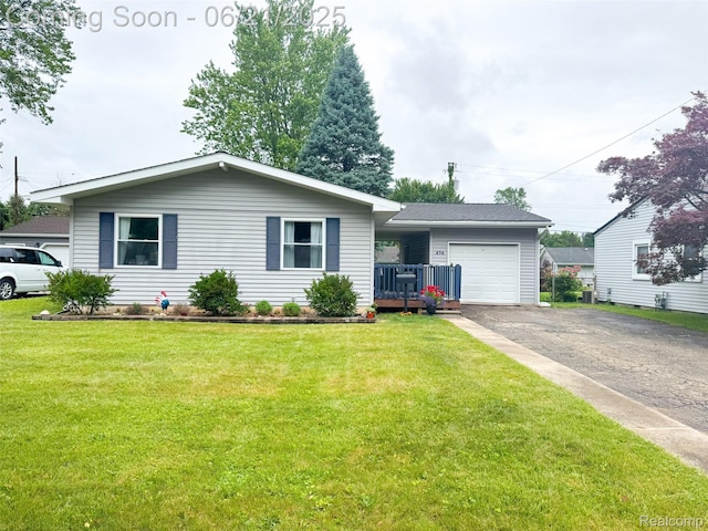 474 Argyle Cres, Milan, MI 48160 - ranch-style house featuring driveway, a garage, and a front yard