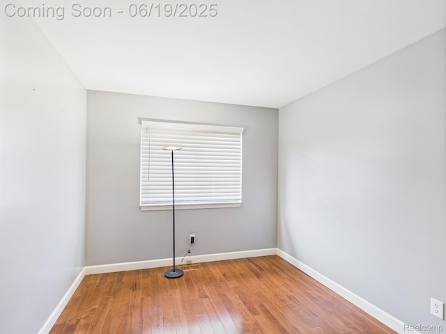 38772 Windmill Pointe N, Clinton Township, MI 48038 - spare room with hardwood / wood-style flooring and baseboards