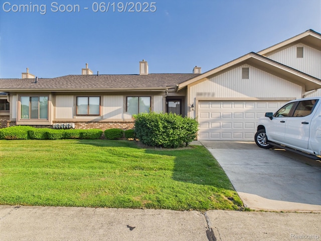 38772 Windmill Pointe N, Clinton Township, MI 48038 - single story home featuring concrete driveway, an attached garage, a front yard, and brick siding