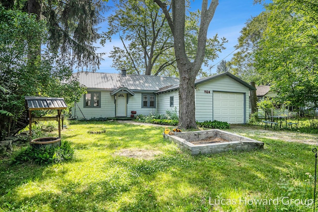 1124 Kusterer Dr NW, Grand Rapids, MI 49534 - view of front of home featuring a front yard and a metal roof