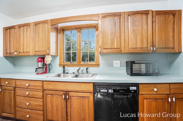 1124 Kusterer Dr NW, Grand Rapids, MI 49534 - kitchen featuring dishwasher, light countertops, and brown cabinets