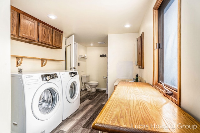 1124 Kusterer Dr NW, Grand Rapids, MI 49534 - laundry room with dark wood-style flooring, washer and dryer, and recessed lighting