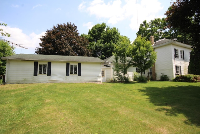 14585 E V Ave, Fulton, MI 49052 - back of property featuring a yard