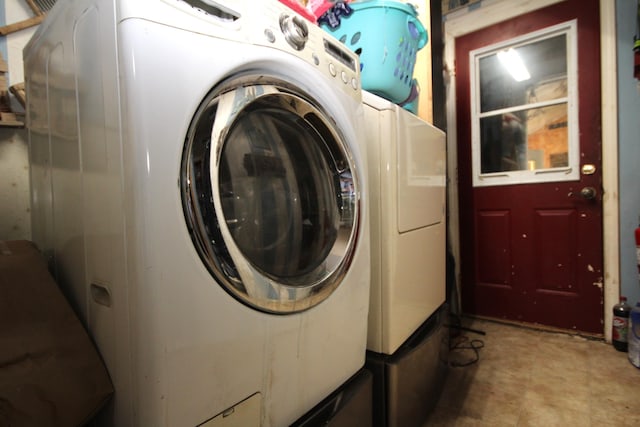 14585 E V Ave, Fulton, MI 49052 - washroom featuring separate washer and dryer
