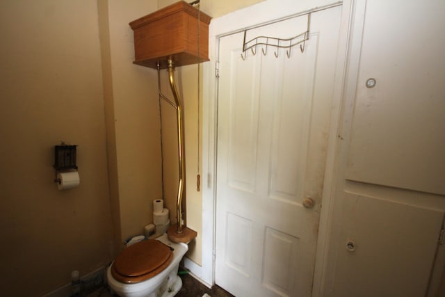 14585 E V Ave, Fulton, MI 49052 - bathroom with toilet and baseboards