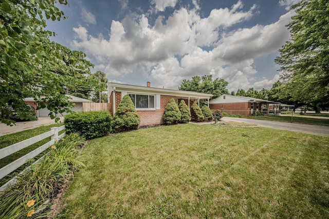 1361 Holmes Rd, Ypsilanti, MI 48198 - ranch-style home featuring brick siding