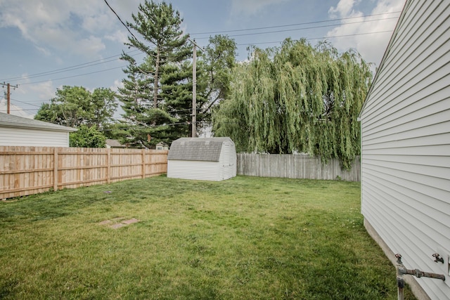 1361 Holmes Rd, Ypsilanti, MI 48198 - fenced backyard featuring a storage shed