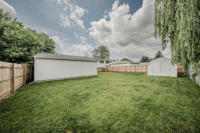 1361 Holmes Rd, Ypsilanti, MI 48198 - fenced backyard with a storage unit