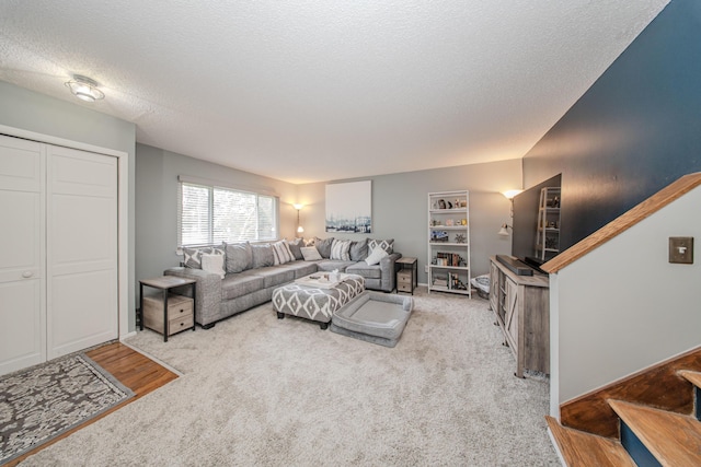 1361 Holmes Rd, Ypsilanti, MI 48198 - living area with a textured ceiling and carpet