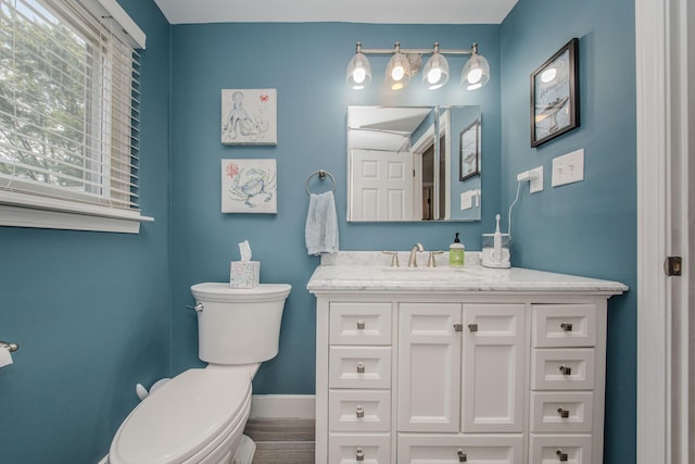1361 Holmes Rd, Ypsilanti, MI 48198 - bathroom with toilet and vanity