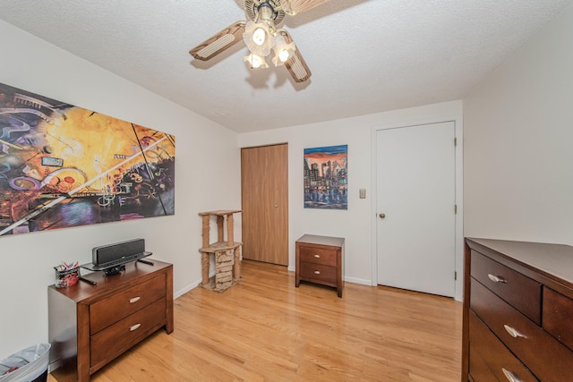 1361 Holmes Rd, Ypsilanti, MI 48198 - bedroom with light wood finished floors and a ceiling fan