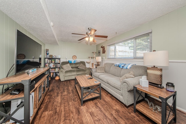 1361 Holmes Rd, Ypsilanti, MI 48198 - living area with a textured ceiling, wood finished floors, a ceiling fan, and a decorative wall